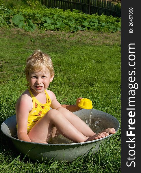 Girl Bathes In A Bucket
