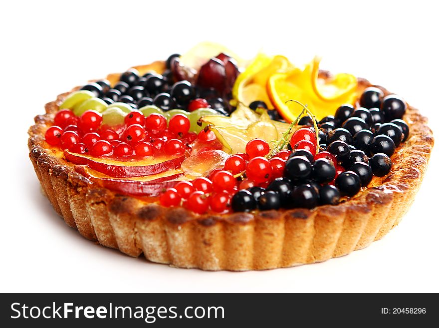 Tasty fruitcake on white background