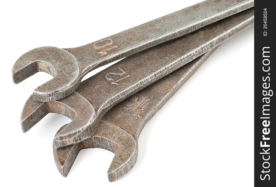 Three metal wrenches on a white background. Three metal wrenches on a white background
