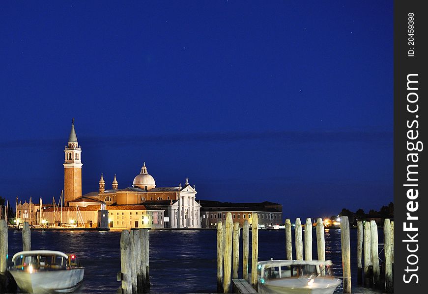 Waiting for the sunset and the blue hour near the Piazza San Marco, Venice, I took this shot of the church of San Giorgio Maggiore and the boats. San Giorgio Maggiore is a 16th century Benedictine church on the island of the same name in Venice. The church is a basilica in the classical renaissance style and its brilliant white marble gleams above the blue water and sky. Waiting for the sunset and the blue hour near the Piazza San Marco, Venice, I took this shot of the church of San Giorgio Maggiore and the boats. San Giorgio Maggiore is a 16th century Benedictine church on the island of the same name in Venice. The church is a basilica in the classical renaissance style and its brilliant white marble gleams above the blue water and sky.