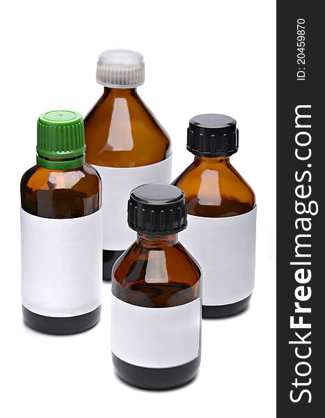 Liquid medicine in glass bottle on white background. Liquid medicine in glass bottle on white background