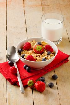 Corn Flakes With Berries On Wooden Table Royalty Free Stock Images
