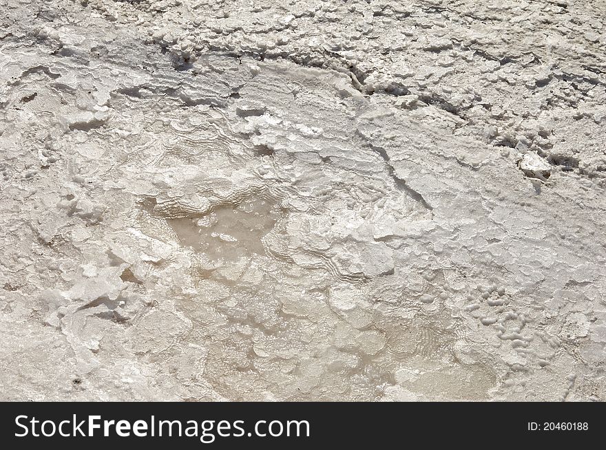 Crystalized salt in an evaporation pond, Algarve, Portugal