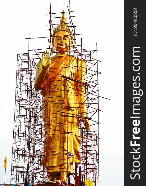 Golden Buddha statue under construction.