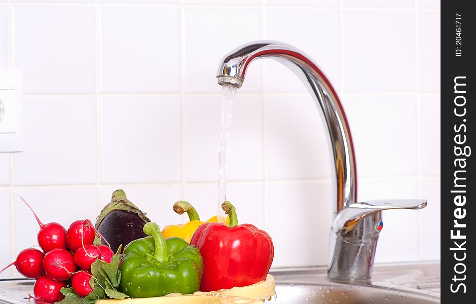 Fresh vegetables in the sink