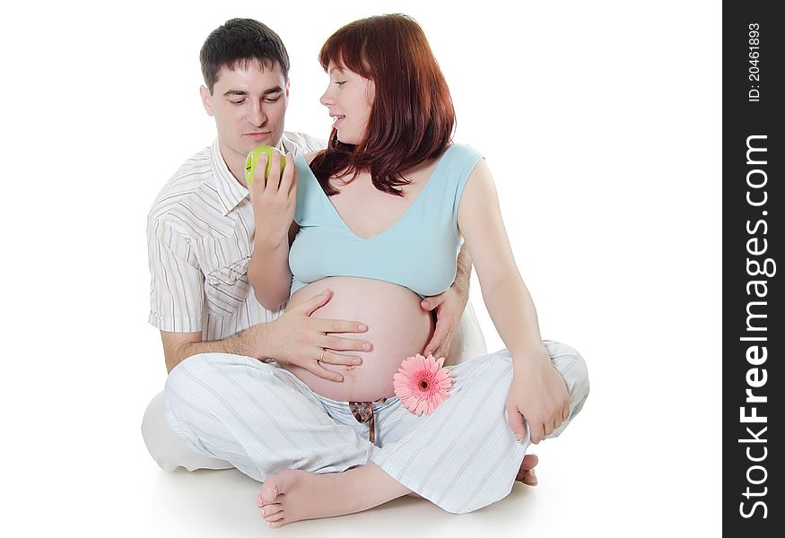 Happy pregnant couple isolated on white background