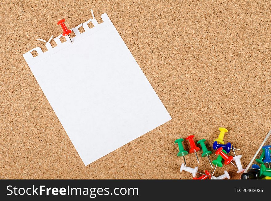 The collection of note papers on corkboard background