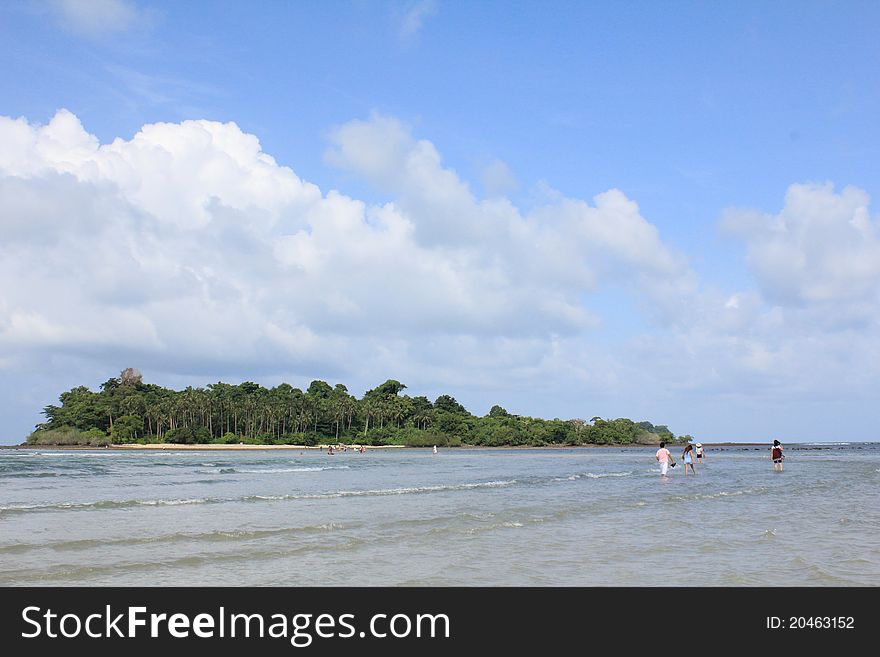 The low tide allows travellers to walk through to the small Island, not far from the beach of Koh Chang, Thailand. The low tide allows travellers to walk through to the small Island, not far from the beach of Koh Chang, Thailand.