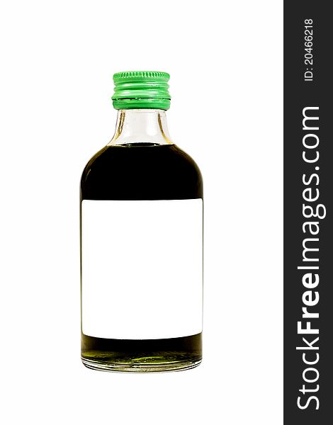 Green liquid in bottle on isolated white. Green liquid in bottle on isolated white.