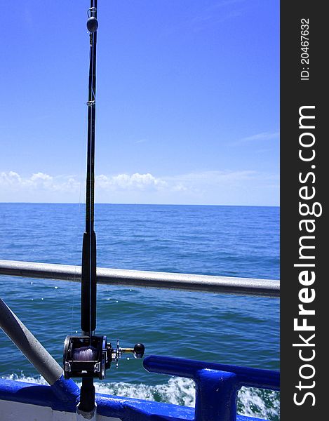 Picture of a fishing pole on a fishing boat. Picture of a fishing pole on a fishing boat
