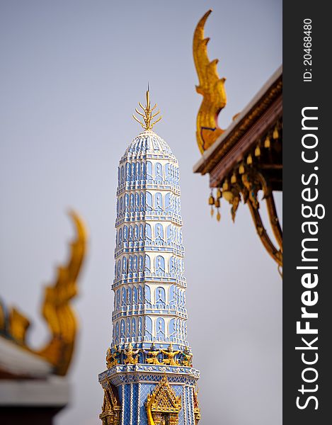 Blue pagoda with golden extensions of a temple in thailand. Blue pagoda with golden extensions of a temple in thailand