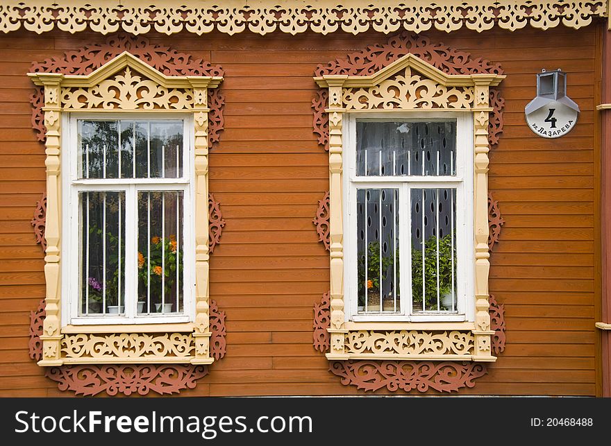 Restored wooden house and fence in the town of Kolomna. Restored wooden house and fence in the town of Kolomna.
