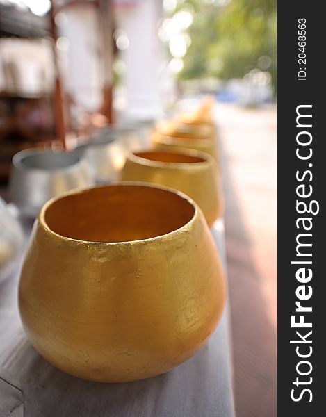 Goldent Alms bowl in a temple in Thailand. Goldent Alms bowl in a temple in Thailand