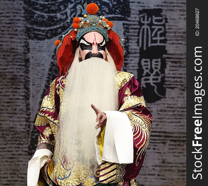 Chinese traditional opera actor performs on stage.