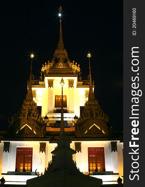 Night scene of the lohaprasada pagoda in thailand