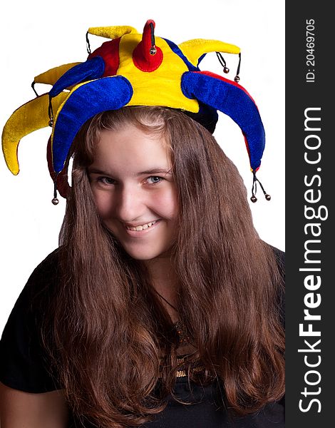 Girl in clown hat on a white background