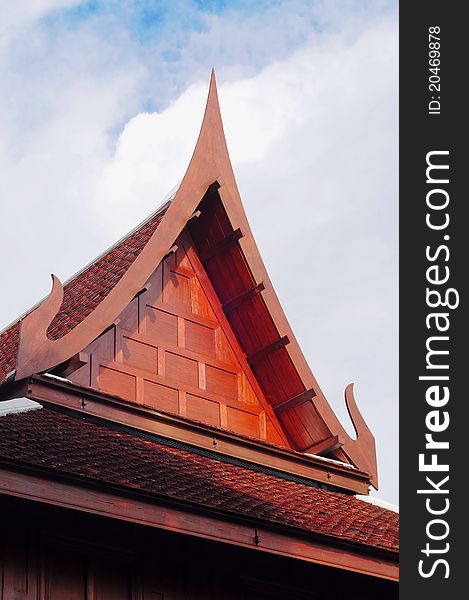 Roof of thai style house in blue sky