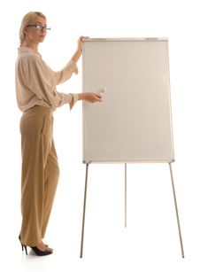 Woman In Glasses Standing Near Drawing Board Royalty Free Stock Photography Woman In Glasses Standing Near Drawing Board Royalty Free Stock Photography