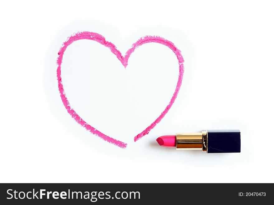 Red lipstick near painted heart shape on white background. Red lipstick near painted heart shape on white background
