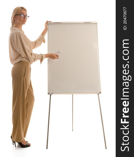 Woman in glasses isstanding near drawing board and pointing something. Woman in glasses isstanding near drawing board and pointing something