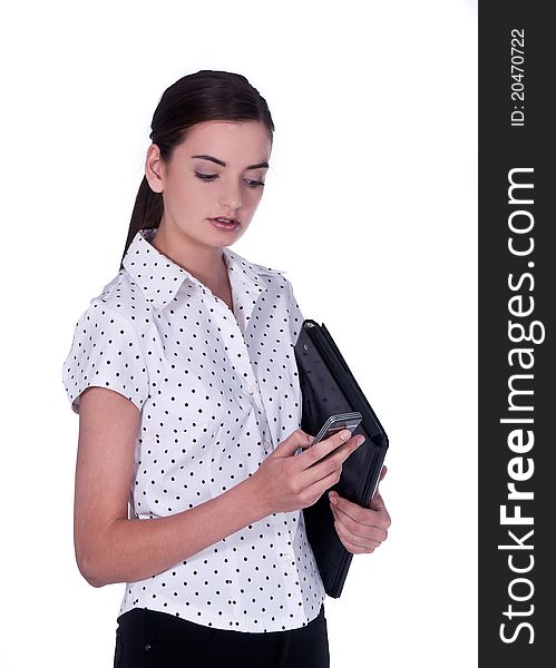 Business woman and phone - over a white background. Business woman and phone - over a white background