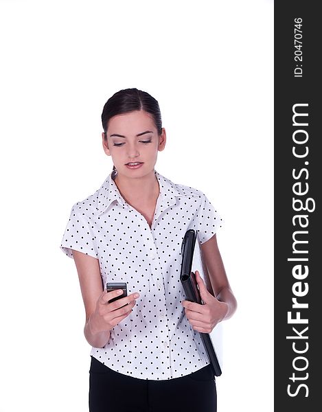 Business woman and phone - over a white background. Business woman and phone - over a white background