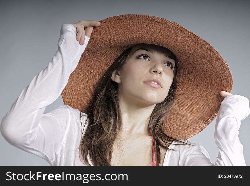 Model Posing With Summer Hat
