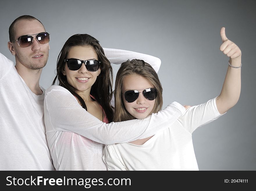 Beautiful white teens showing ok sign