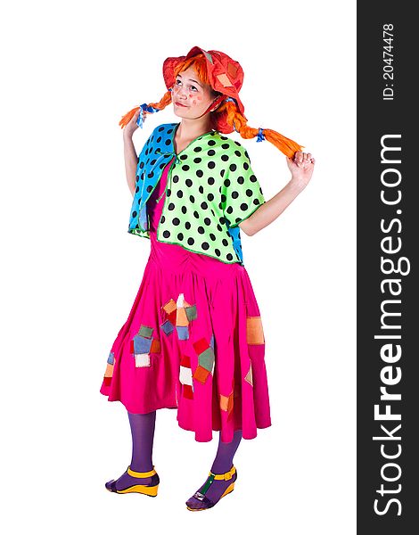 A girl dressed as a clown red. White background. Studio photography. A girl dressed as a clown red. White background. Studio photography.