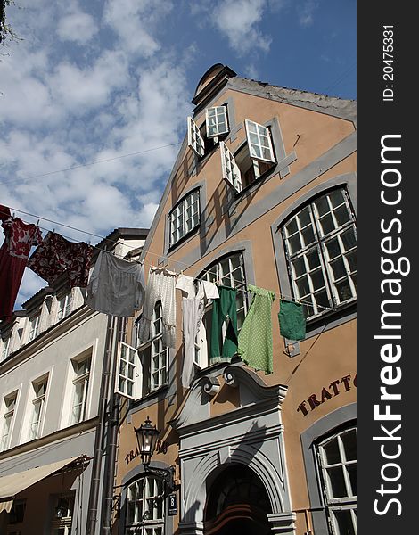 Colorful houses in Riga, Latvia, with laundry hanging between the windows