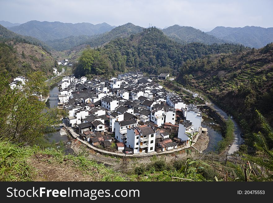 High angle view of jujing village built around the turn of a creek in wuyuan county, jiangxi province, china. High angle view of jujing village built around the turn of a creek in wuyuan county, jiangxi province, china.