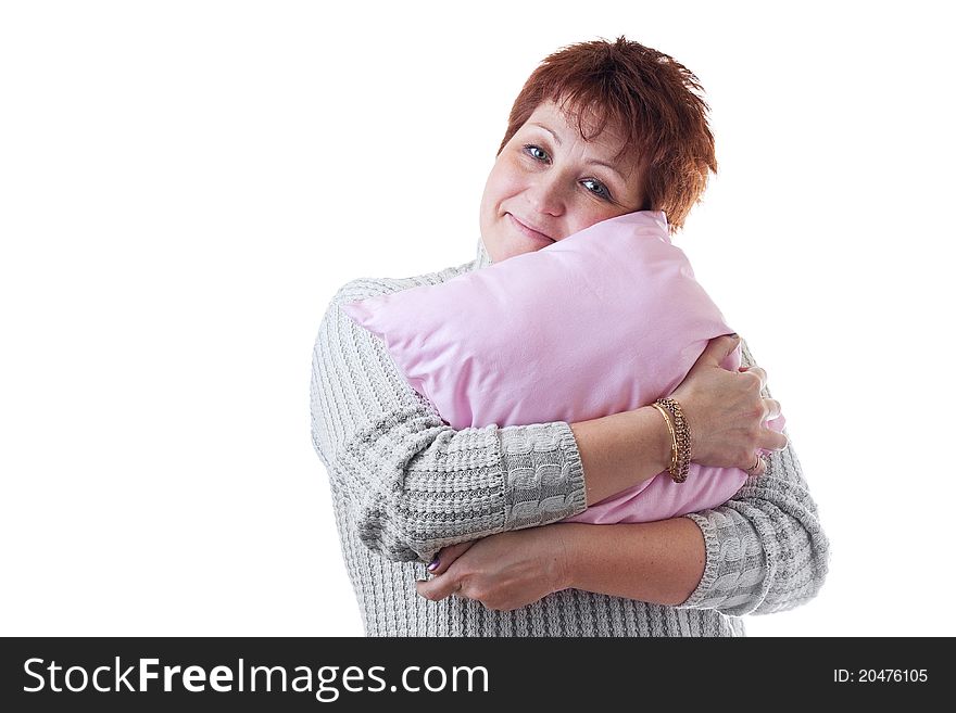 Smiling Woman Hugs Pink Pillow