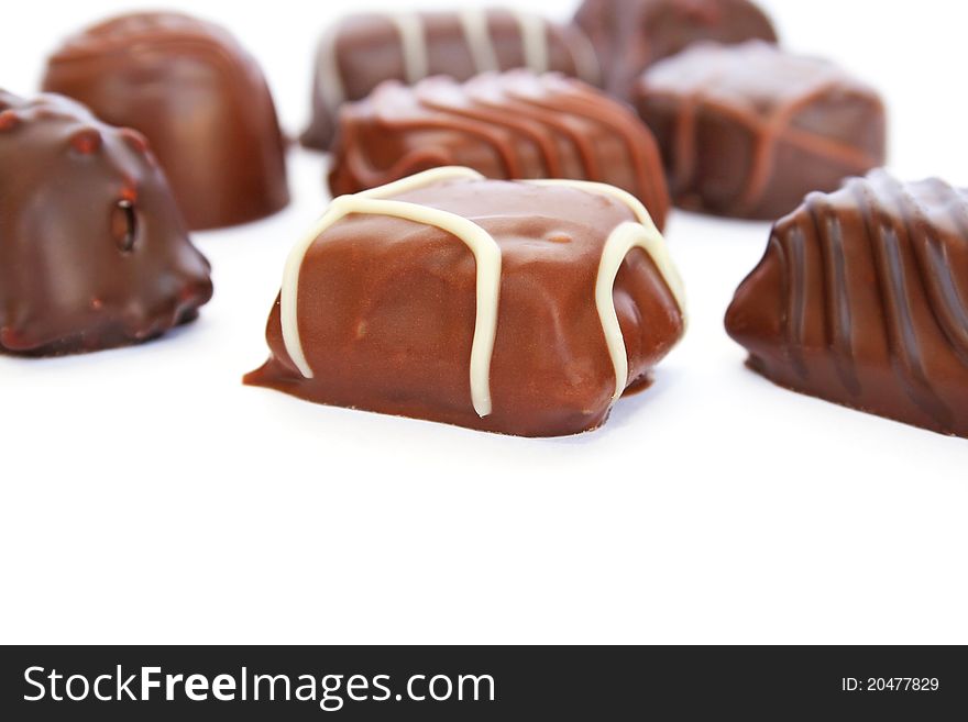 Chocolate  on white background, closeup picture.