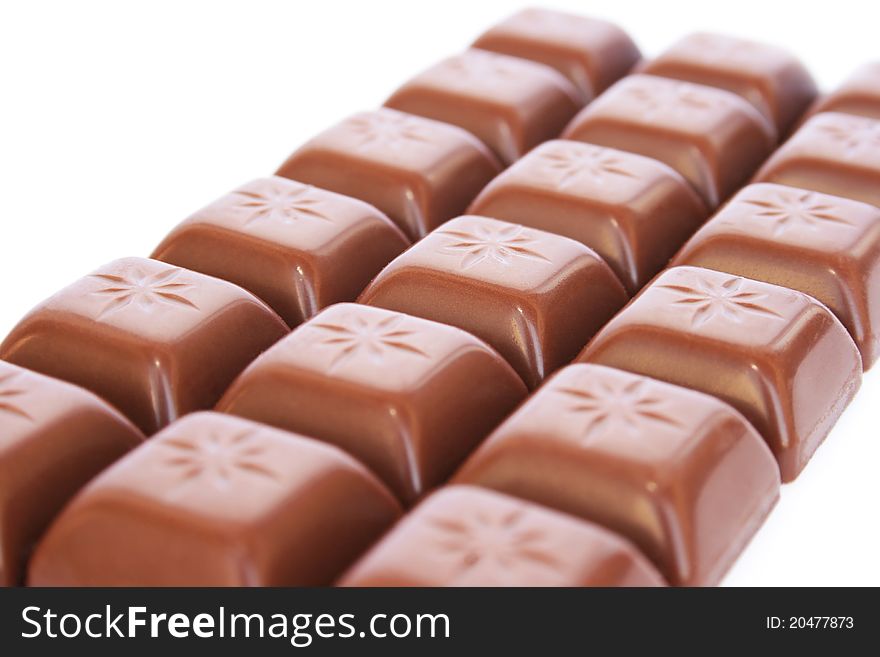 Chocolate  on white background, closeup picture.