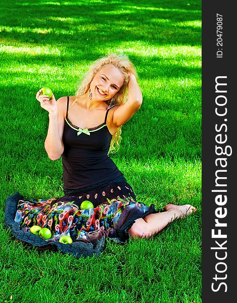 Portrait of cheerful young girl with green apples. Portrait of cheerful young girl with green apples