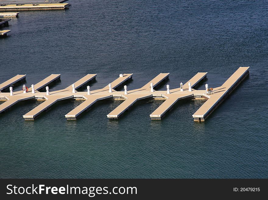 Empty boat dock on the lake aerial view. Empty boat dock on the lake aerial view