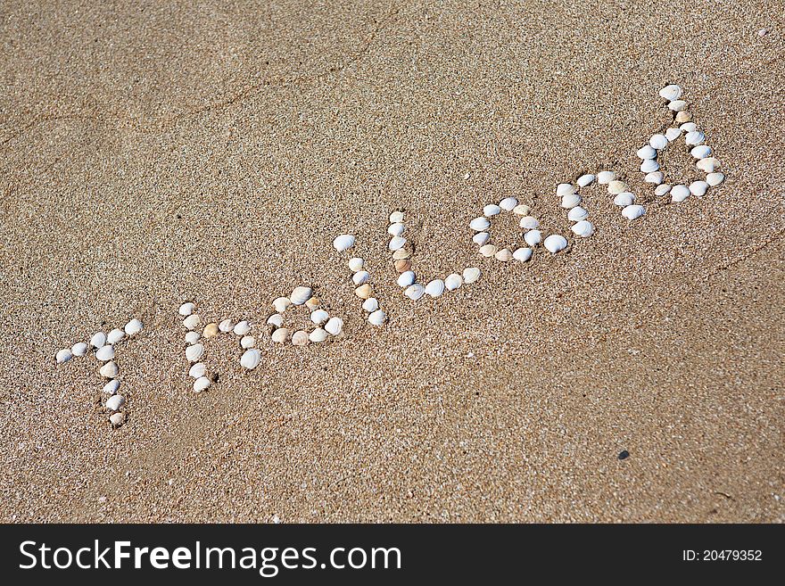 Thailand, seashells written on the sand. Thailand, seashells written on the sand