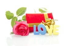 Red Rose, Gift Box And The Text LOVE Royalty Free Stock Photo Red Rose, Gift Box And The Text LOVE Royalty Free Stock Photo