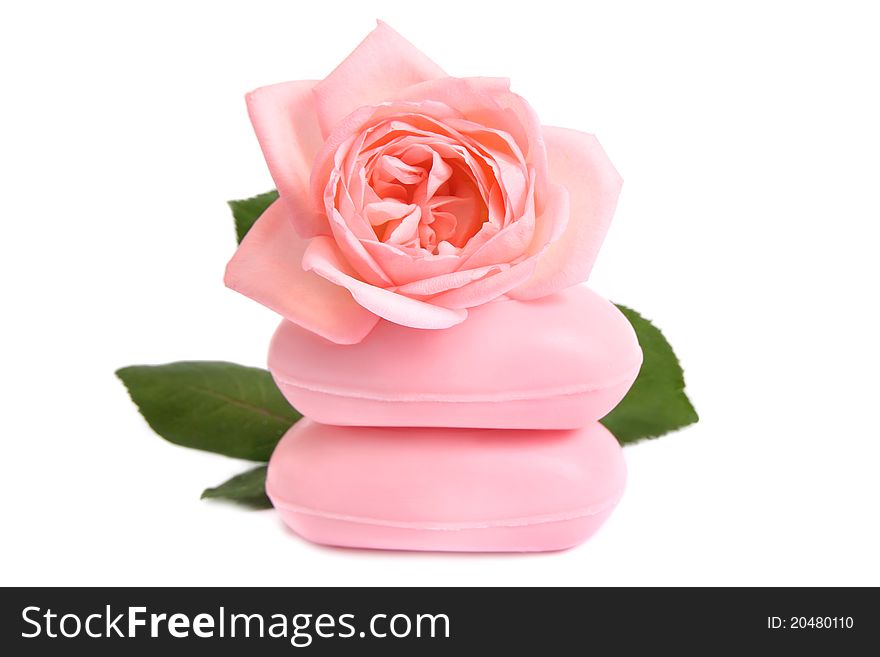 Beautiful rose flower  with scented soap symbolyzing freshness and purity. Beautiful rose flower  with scented soap symbolyzing freshness and purity