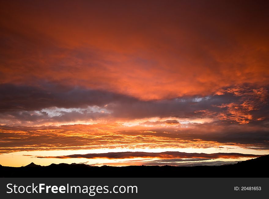 Colorful sunset ambient under glowing clouds. Colorful sunset ambient under glowing clouds