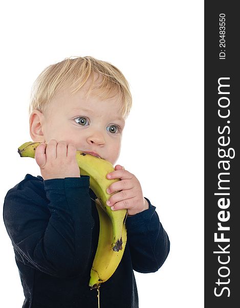 Two years old boy with banana on white. Two years old boy with banana on white