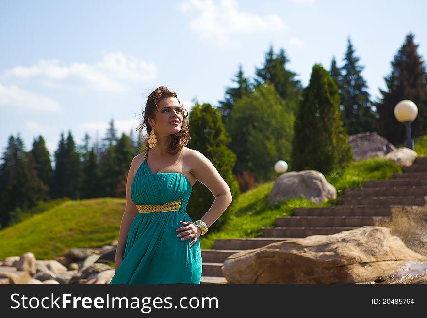 Beautiful girl in the blue walks. Beautiful girl in the blue walks