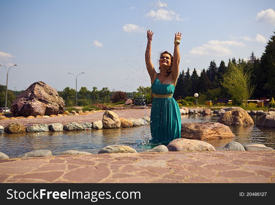 Extraordinarily beautiful girl in a blue dress