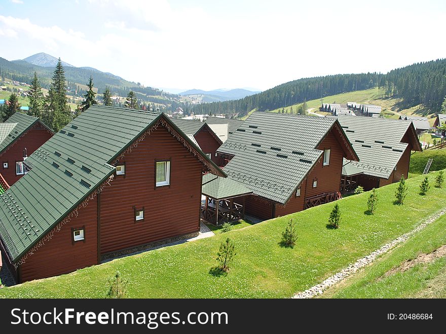 Brown wooden houses in the mountains