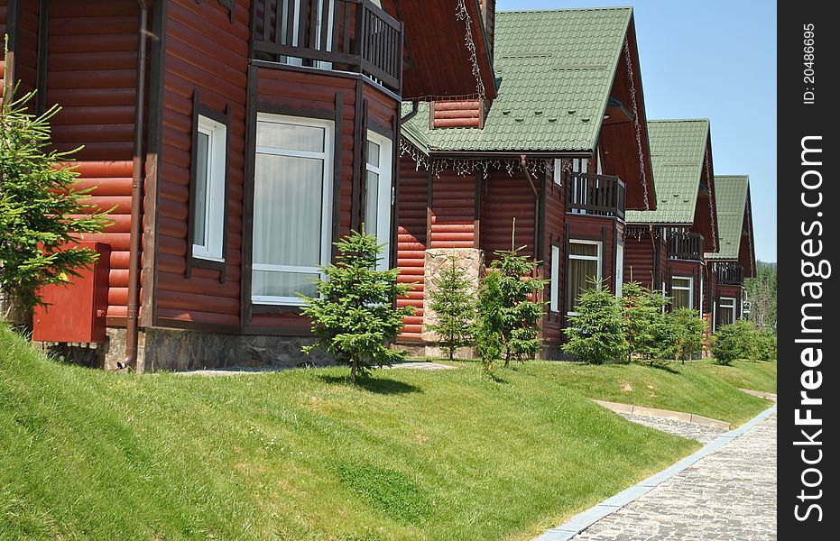 Brown wooden houses in the mountains