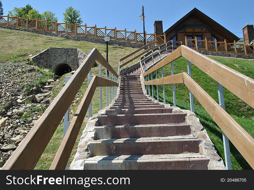 Stairs up to the wood house