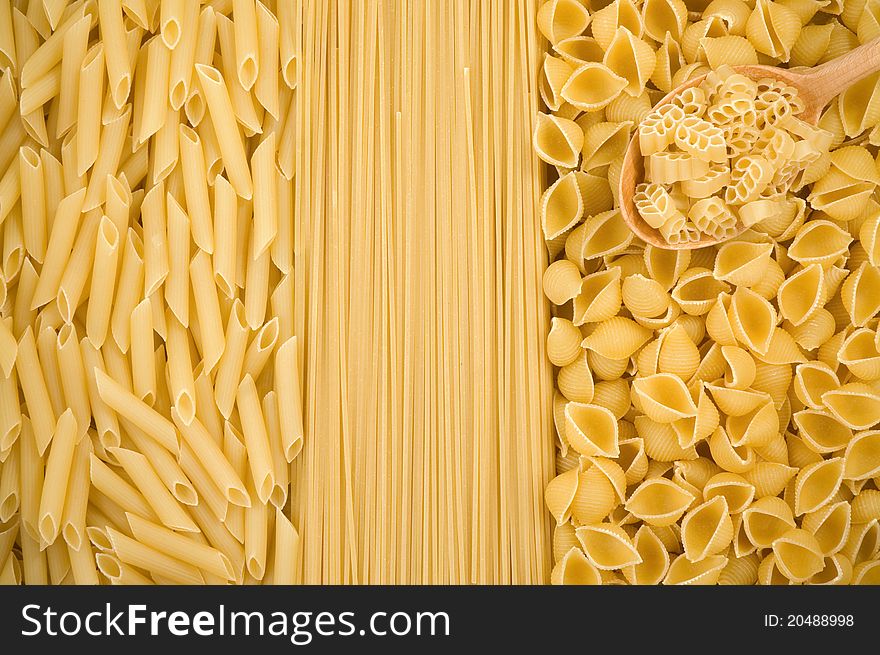 Raw pasta as whole background. Raw pasta as whole background