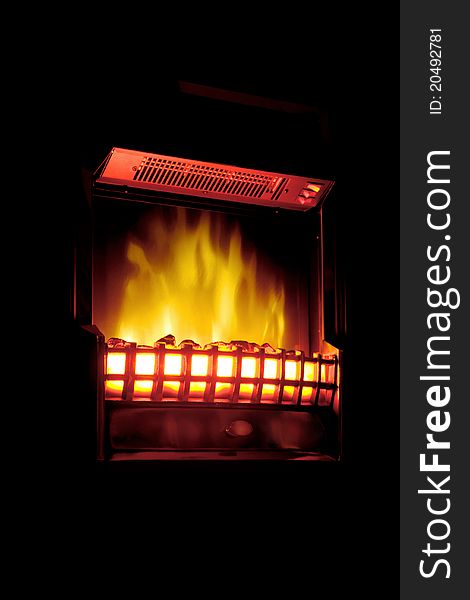 Heater with a flame effect, located on a black background. Heater with a flame effect, located on a black background.