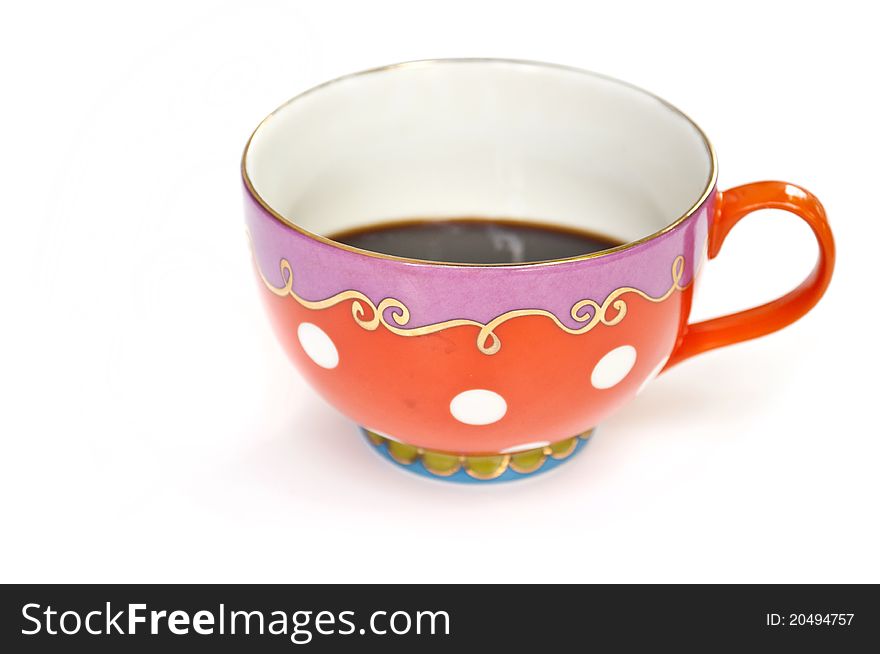 Colored cup of coffee on white