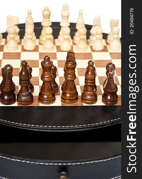 Chessboard isolated on white - closeup